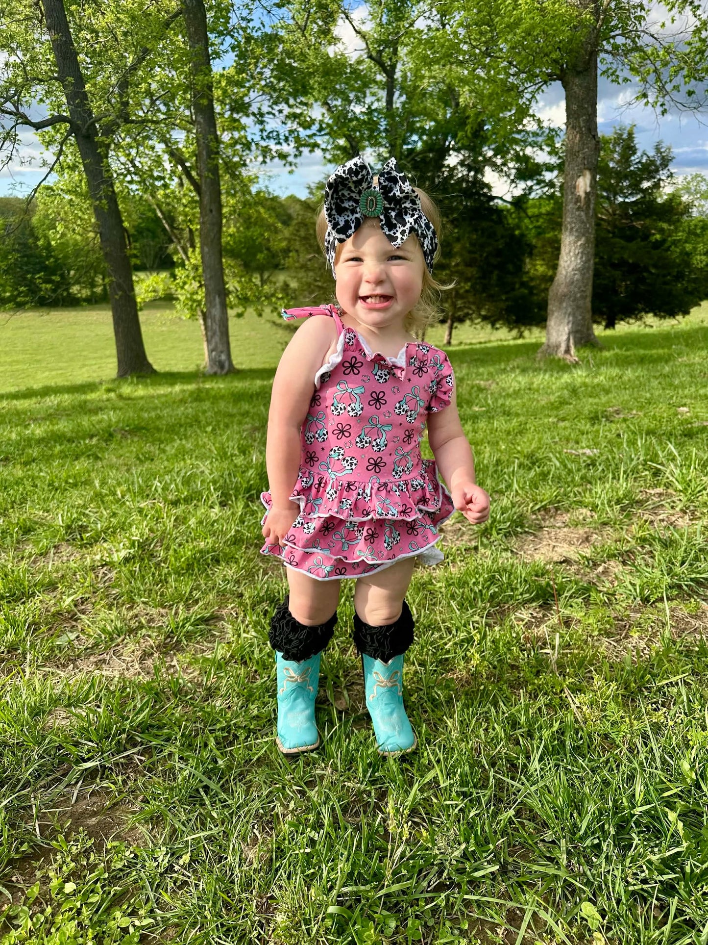 Cow print cherry ruffle romper