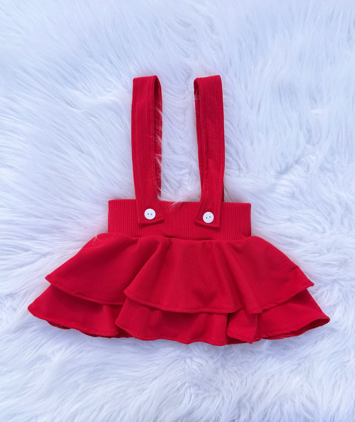 Red suspender skirt