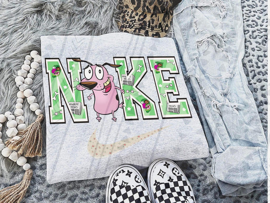 Timid Hero Dog Graphic Tee – Spooky Cartoon Pup Swoosh Shirt – Gildan Adult & Youth Unisex – DTF Printed Quirky Fantasy Tee