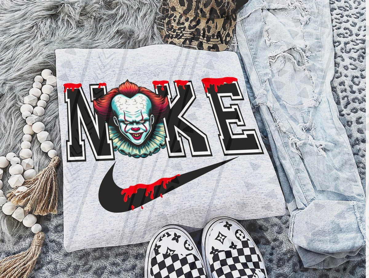 Creepy Clown Horror Graphic Tee – Killer Circus Swoosh Shirt – Gildan Unisex Adult & Youth – DTF Printed Halloween Shirt - Pretty Petty Co