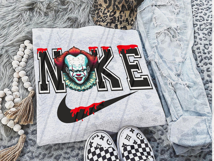 Creepy Clown Horror Graphic Tee – Killer Circus Swoosh Shirt – Gildan Unisex Adult & Youth – DTF Printed Halloween Shirt - Pretty Petty Co