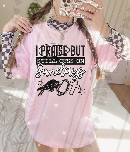 I Praise But Still Cuss On Sundays Football Shirt – Edgy Christian Sports Graphic Tee – Unisex DTF Print – Youth & Adult Sizes