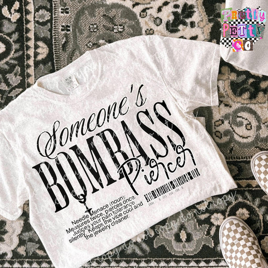 Somebody’s Bombass Piercer Shirt – Funny Tattoo & Body Art Graphic Tee – Comfort Colors Unisex T-Shirt – DTF Printed Gift for Piercers