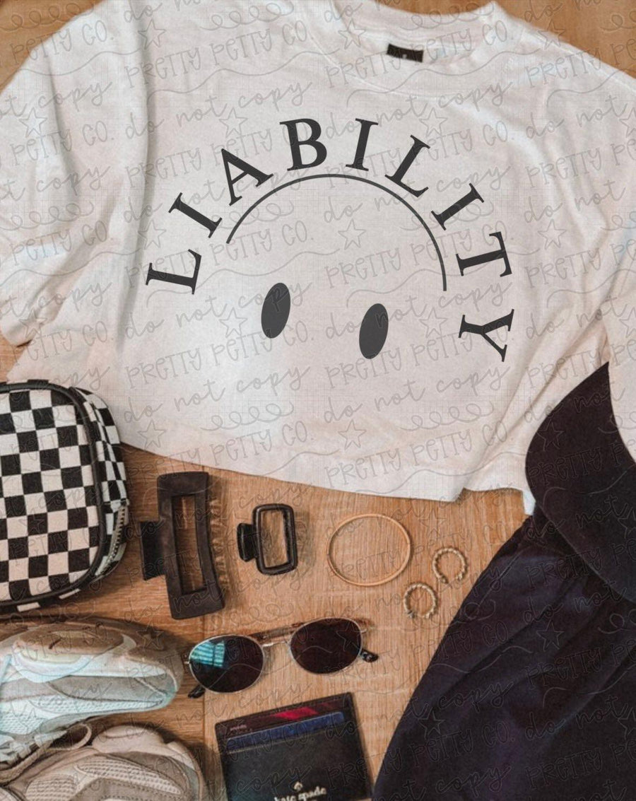Liability Graphic Crop Tee | Funny Trendy Boutique Shirt | Cute Sarcastic Graphic T-Shirt for Women | Retro Western Style Tee