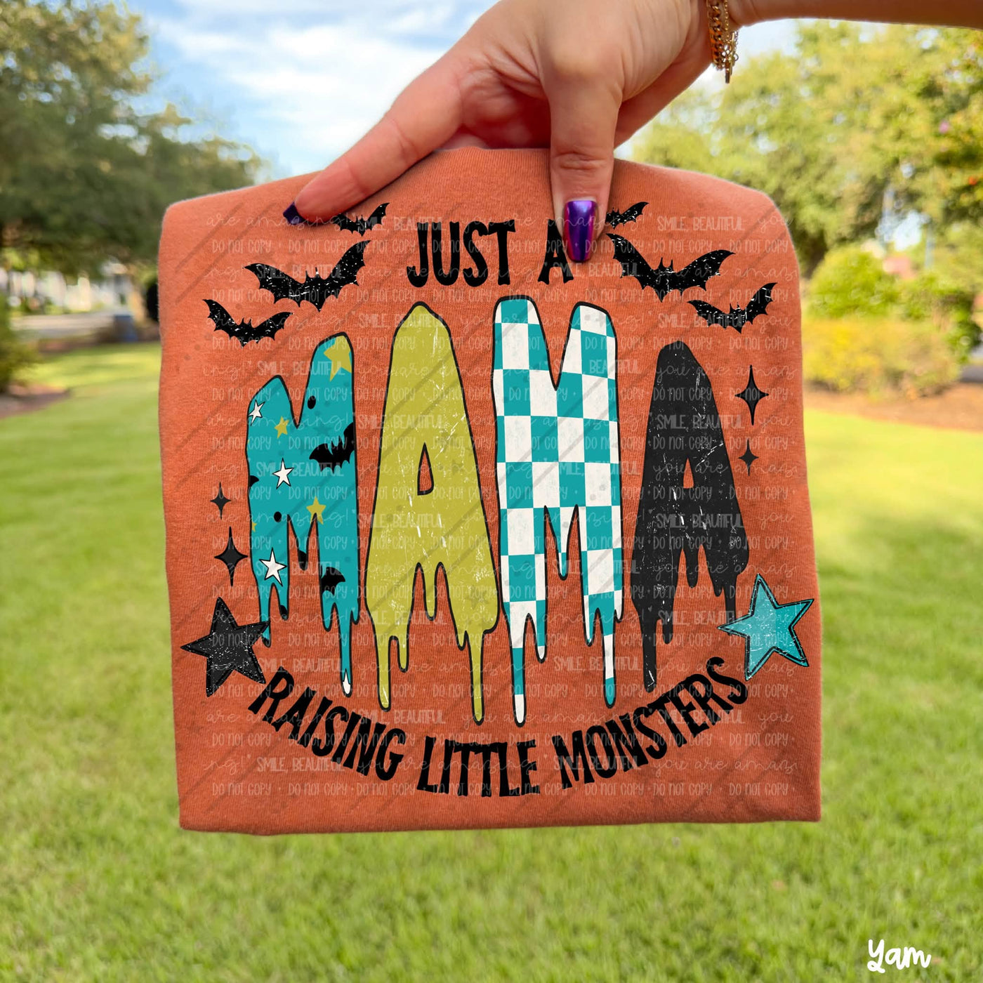 Just a Mama Raising Little Monsters Halloween Graphic Tee – Spooky Mom Shirt
