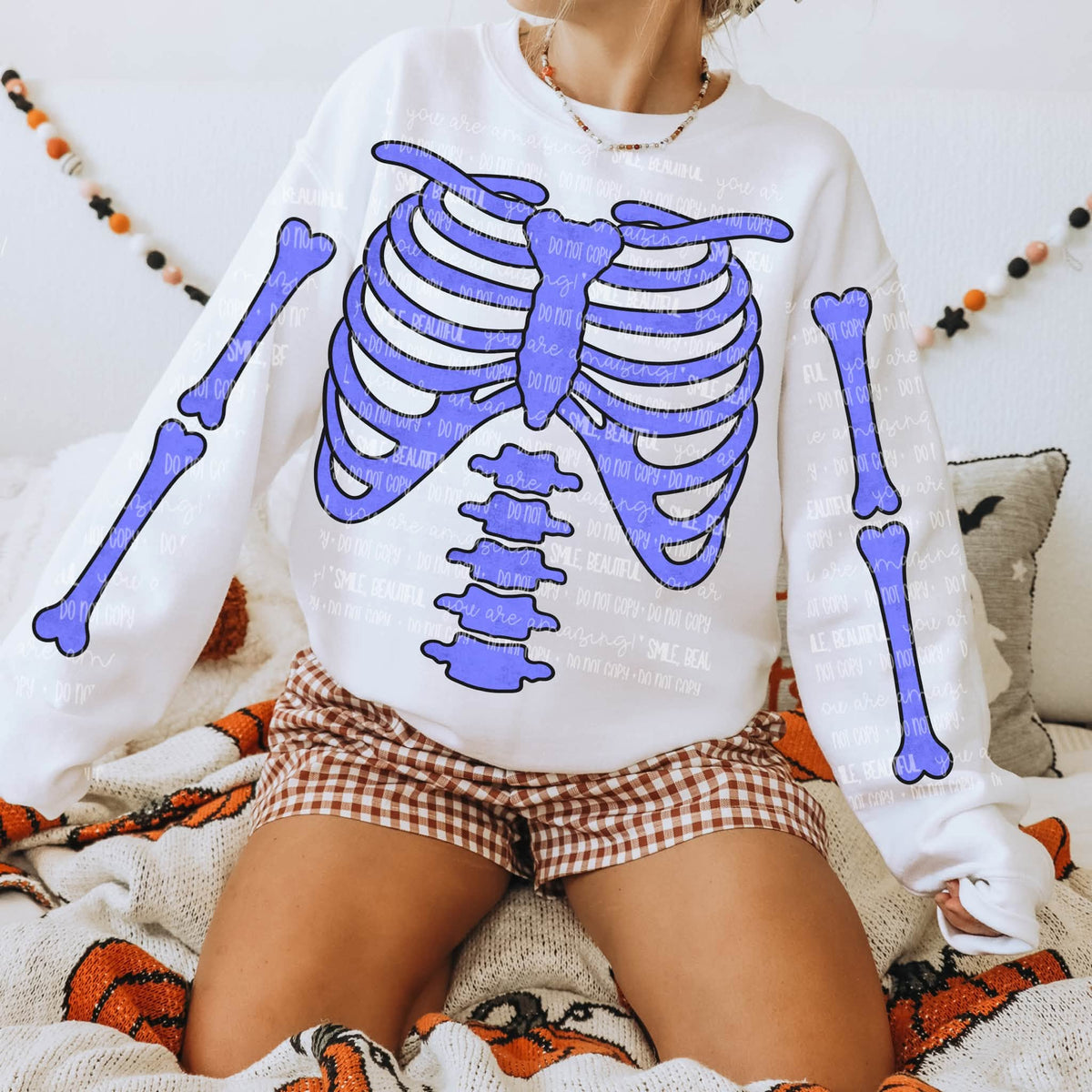 Halloween Skeleton Bones Sweatshirt | Colorful Rib Cage & Bone Sleeve Graphic Crewneck