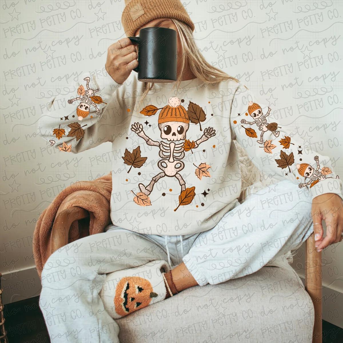 Dancing Skeletons Fall Leaves Cozy Autumn Graphic Sweatshirt