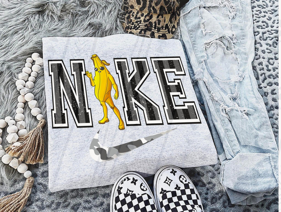 Banana Gamer Shirt | Funny Battle Royale Inspired Tee | Cute Gaming Graphic Shirt Trendy Video Game Shirt - Pretty Petty Co