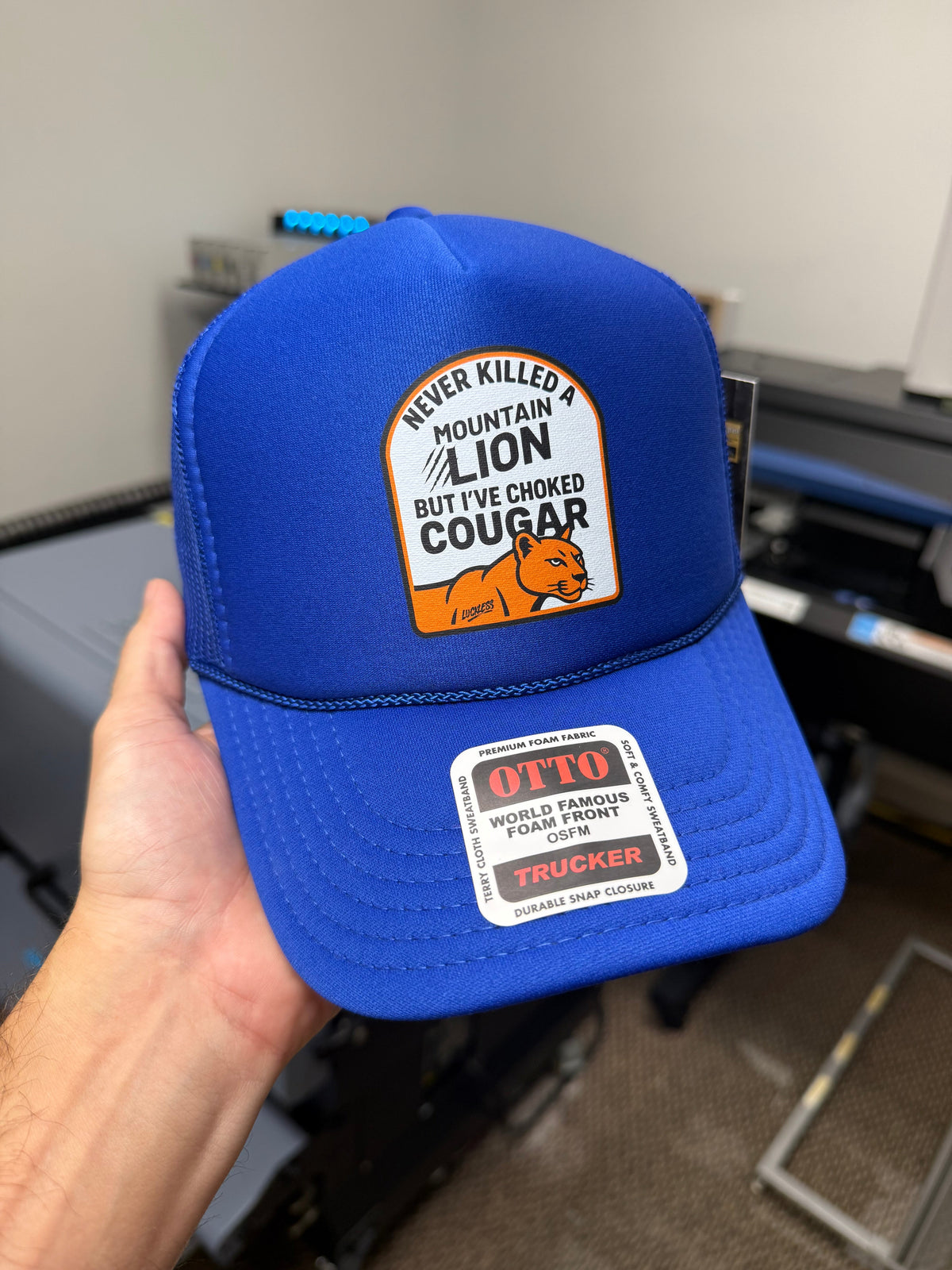 Never Killed A Mountain Lion But I've Choked A Cougar Trucker Hat - Pretty Petty Co