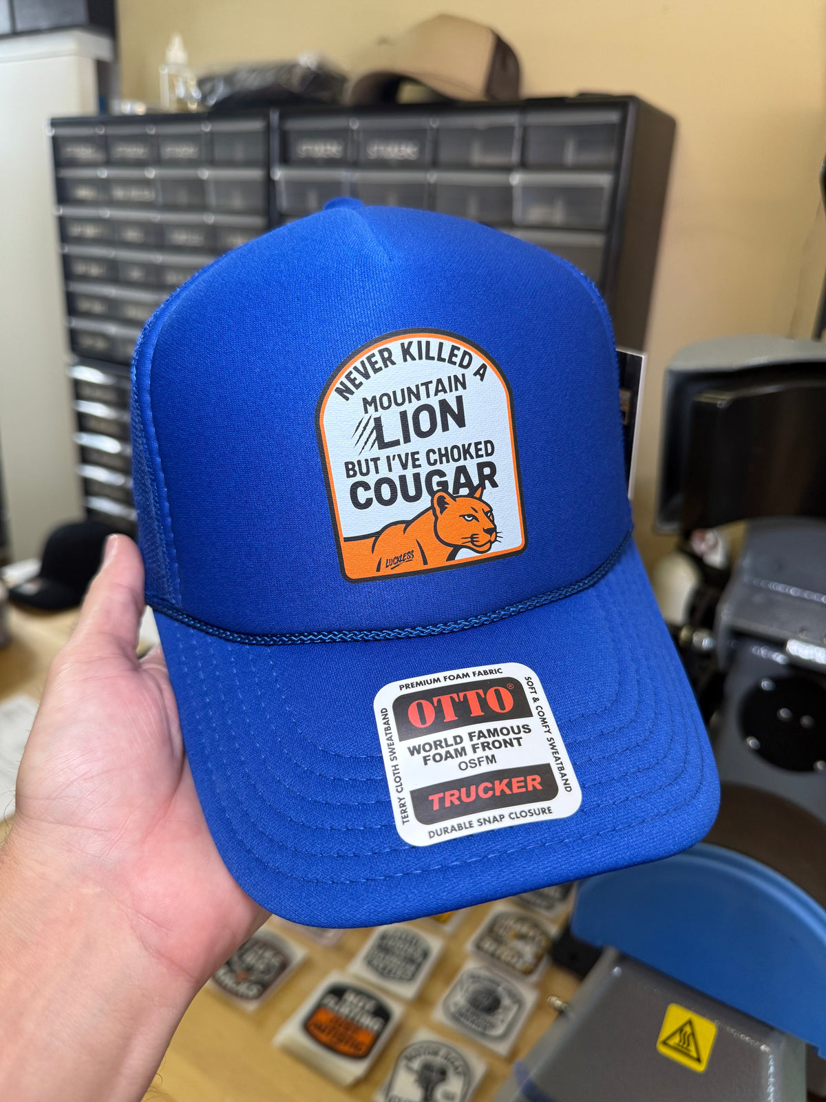 Never Killed A Mountain Lion But I've Choked A Cougar Trucker Hat - Pretty Petty Co