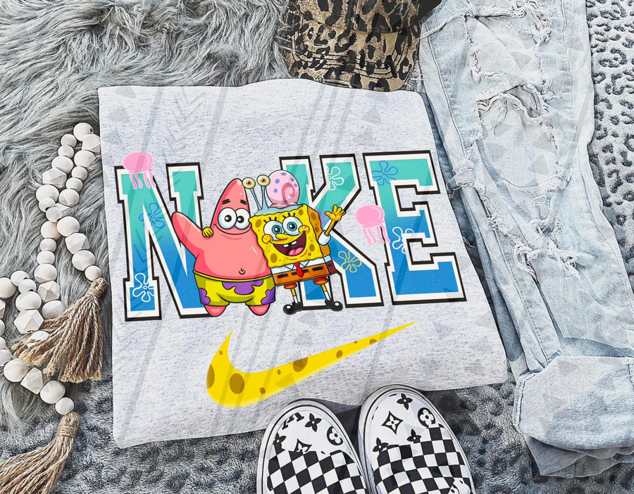 Cheerful Yellow Sea Sponge Graphic Tee – Cartoon Ocean Adventure Swoosh Shirt – Gildan Adult & Youth Unisex – DTF Printed Fun Tee - Pretty Petty Co