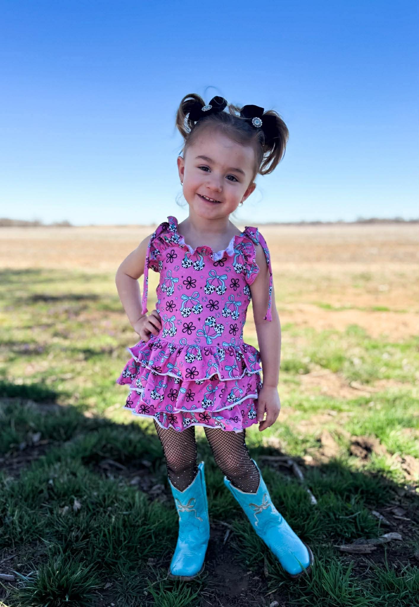 Cow print cherry ruffle romper