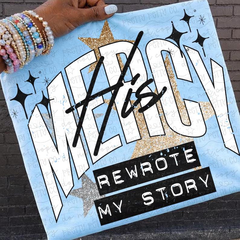 His Mercy Rewrote My Story Graphic Tee – Inspirational Faith Glitter Star Shirt
