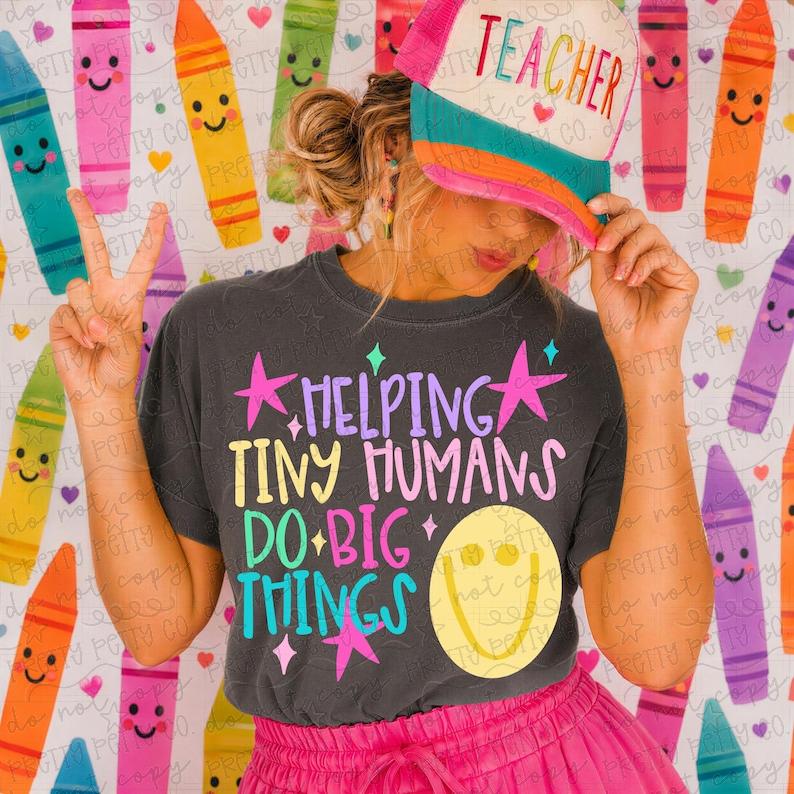 Helping Tiny Humans Do Big Things Teacher Shirt | Colorful Retro Teacher Graphic Tee | Back to School Educator T-Shirt